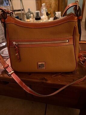 Dooney & Bourke Pebble Leather Crossbody in Mustard with Tan Trim